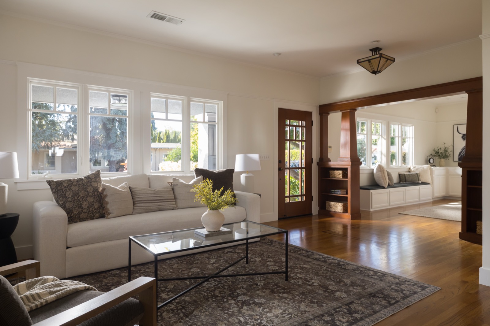 Living room seating area with windows