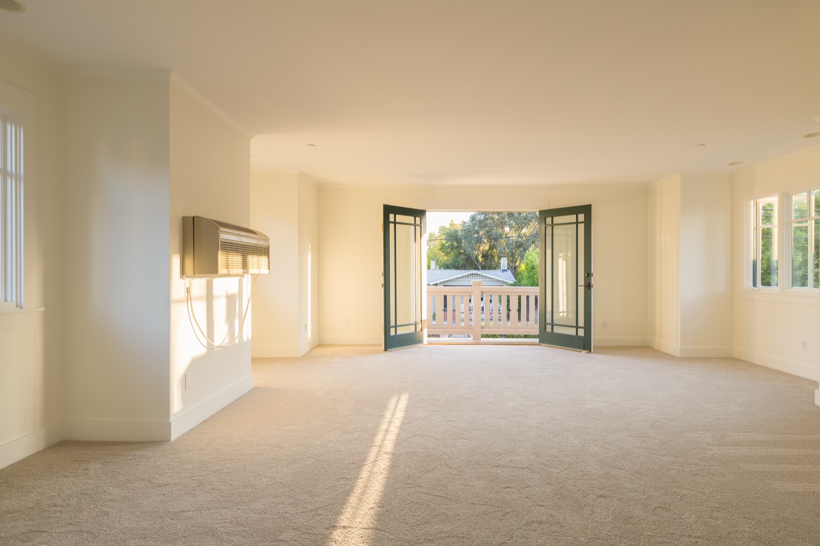 Private retreat room with open doors to a balcony